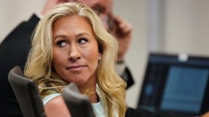 FILE - U.S. Rep. Marjorie Taylor Greene sits in the courtroom, Friday, April 22, 2022, in Atlanta.(AP Photo/John Bazemore, Pool)