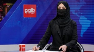 Khatereh Ahmadi, a TV anchor, wearing a face covering as she read the news on TOLO NEWS, in Kabul, Afghanistan, May 22, 2022. (AP Photo/Ebrahim Noroozi)