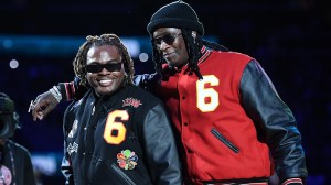 Gunna and Young Thug perform at half-time at the game between the Atlanta Hawks and the Boston Celtics on Nov. 17, 2021, at State Farm Arena in Atlanta.   (Adam Hagy/NBAE)