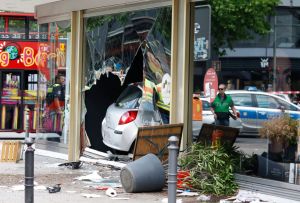 The car that was droven into a group of people killing one person and injuring eight injured is pictured in central Berlin, on June 8, 2022. (Photo by ODD ANDERSEN/AFP via Getty Images)