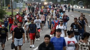 Migrants walk on the road at the migrant caravan in Huixtla, Chiapas, in Mexico on June 9, 2022. The caravan from Huixtla to Mapastepec restarted with an approximate contingent of 3,000 migrants. (Photo by Jacob Garcia/Anadolu Agency via Getty Images) (Jacob Garcia/Anadolu Agency via Getty Images)