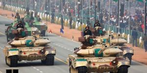 Indian tanks participate in a military parade.   © Reuters