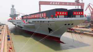 China's third aircraft carrier, the Fujian, named after Fujian Province, is seen during a launching ceremony in Shanghai on June 17. (Photo by Li Tang/VCG via Getty Images)
