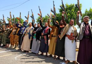 Yemeni gunmen loyal to the Huthi movement brandish their weapons during a rally in the capital Sanaa, to show support to the movement against the Saudi-led intervention in the country on July, 7, 2020. (Photo by Mohammed HUWAIS / AFP) (Photo by MOHAMMED HUWAIS/AFP via Getty Images)