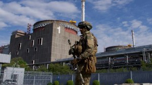 A Russian soldier near Ukraine's Zaporizhzhia nuclear power station in the town of Energodar in May 2022. Photo: Andrey Borodulin/AFP via Getty Images