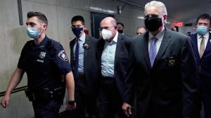 Allen Weisselberg, center, former President Donald Trump's company chief financial officer, arrives to attend the hearing for the criminal case at the criminal court in lower Manhattan in New York on July 1, 2021. (TIMOTHY A. CLARY/AFP via Getty Images)