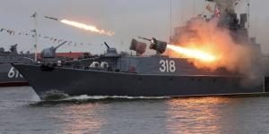 The Russian Aleksin corvette fires missiles during a parade in Baltiysk in the Kaliningrad region of Russia on July 31.   © Reuters