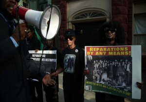 Pro-reparations protesters / Getty Images