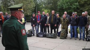 A Russian soldier addresses reservists during the partial mobilization of troops in the town of Volzhsky in Russia's Volgograd region on September 28.