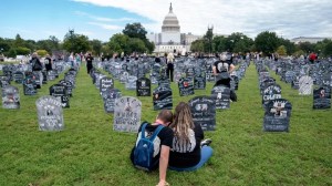 People who lost loved ones to drug overdoses set up imitation graves near the U.S. Capitol Sept. 24. (Stefani Reynolds/AFP via Getty Images)