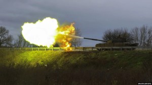 Ukrainian soldiers fire at Russian forces from a seized Russian T-80 tank on a road near the city of Bakhmut on October 27.