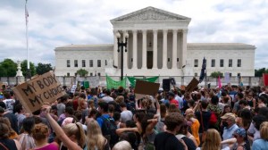 Abortion-rights protesters gather outside the Supreme Court in Washington, Friday, June 24, 2022.  ((AP Photo/Jose Luis Magana))