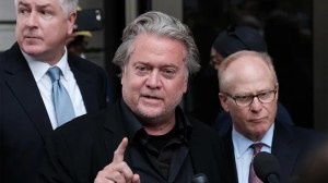 Former Trump White House chief strategist Steve Bannon speaks with the media at the end of the opening day of his trial on contempt of Congress charges. On Friday, a federal judge denied his request for a new trial after he was convicted in July.  (Reuters/Michael A. McCoy)