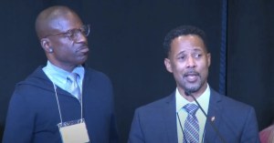 The Rev. Cedrick Bridgeforth (right), gives remarks on Friday, Nov. 4, 2022, shortly after being elected by delegates of the Western Jurisdiction to be the first openly gay black bishop in The United Methodist Church. | Screengrab: YouTube/Western Jurisdiction of the UMC