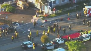 First responders arrive to the scene of a crash that saw a vehicle plow into at least 11 police recruits on Wednesday. (Fox 11) (Fox 11)