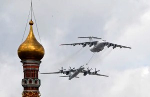 A Russian Tu-95MS strategic bomber and an Ilyushin Il-78 aerial refueling tanker fly over the Kremlin and Red Square in Moscow on May 7, 2021
(photo credit: ALEXANDER NEMENOV/AFP via Getty Images