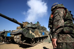 South Korean soldiers participate in a river crossing exercise with U.S. soldiers in Yeoju, South Korea, on Oct. 19, 2022. (Chung Sung-Jun/Getty Images)