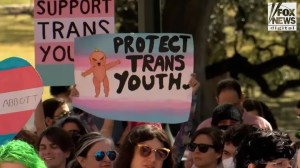 Demonstrators protest in support of rights for transgender youth. (Fox News )