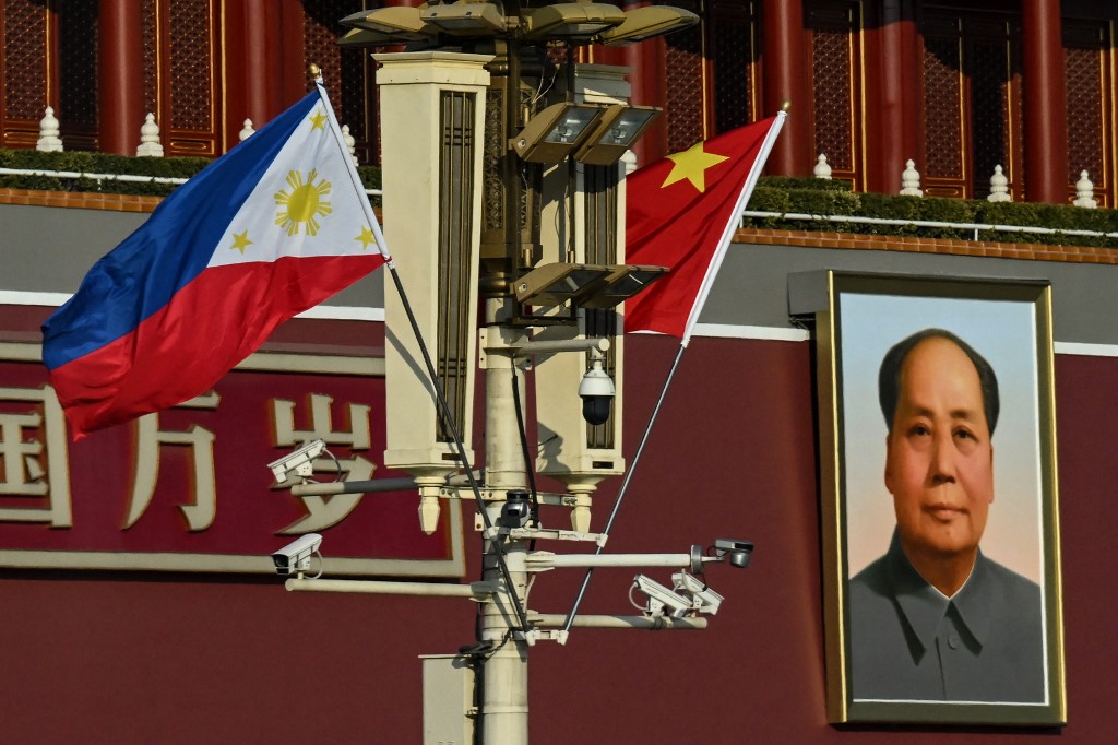 The national flags of the Philippines and China are seen together near the Tiananmen Gate as Philippine President Ferdinand Marcos Jr visits, in Beijing on January 3, 2023. Photo: Noel Celis/AFP.