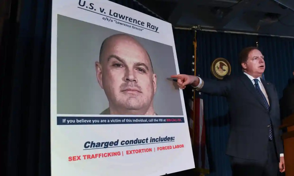 US officials announce the indictment against Larry Ray in February 2020. Photograph: Stephanie Keith/Getty Images