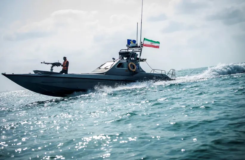A boat of the Iranian Revolutionary Guard (IRGC) sails, at undisclosed place off the coast of Bandar Abbas,(photo credit: NAZANIN TABATABAEE/WANA VIA REUTERS)
