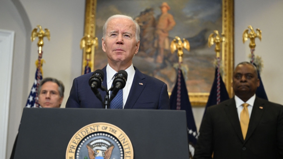 U.S. President Joe Biden, with Secretary of State Antony Blinken (L) and Defense Secretary Lloyd Austin, speaks about the continued support of Ukraine in its fight against Russia, in the Roosevelt Room of the White House in Washington on Jan. 25, 2023. (Andrew Caballero-Reynolds/AFP via Getty Images)
