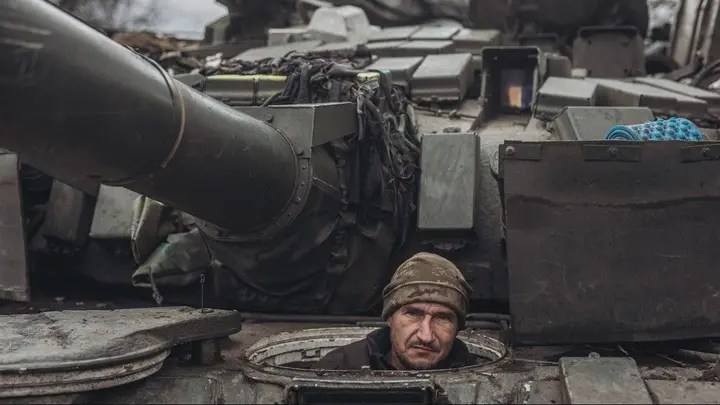 A Ukrainian soldier drives a tank on the Donbass frontline as military mobility continues within the Russian-Ukrainian war on Jan. 18, 2023.  (Diego Herrera Carcedo/Anadolu Agency via Getty Images)