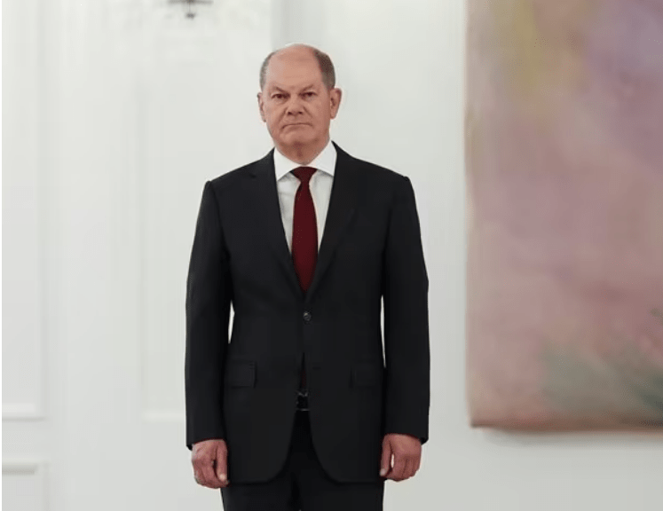 German Chancellor Olaf Scholz stands at a ceremony at Schloss Bellevue in Berlin to appoint incoming German Defense Minister Boris Pistorius Thursday. (Maja Hitij/Getty Images)

Read more: Germany Blocks Tanks for Ukraine as Casualties Mount | Newsmax.com