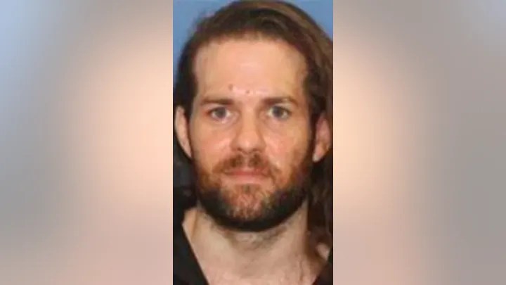 This undated photo provided by the Grants Pass Police Department shows Benjamin Obadiah Foster, who is accused of torturing a woman he held captive less than two years after he was convicted in Nevada of critically injuring another woman he held captive for two weeks. (Grants Pass Police Department via AP)
