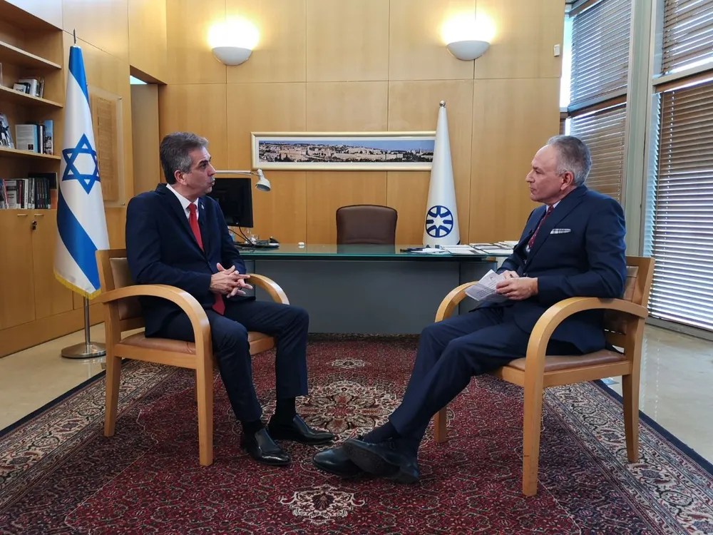 Daniel GitmanIsrael's Foreign Minister Eli Cohen (L) during an interview with i24NEWS.