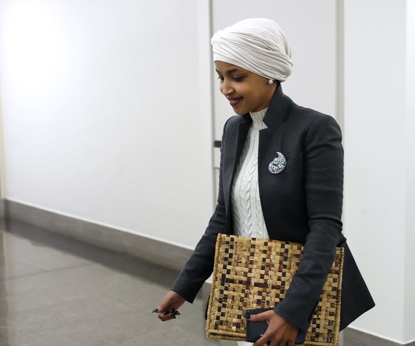 Rep. Ilhan Omar, D-Minn., leaves her office at the Longworth House Office Building on Capitol Hill Thursday.  (Kevin Dietsch/Getty Images)