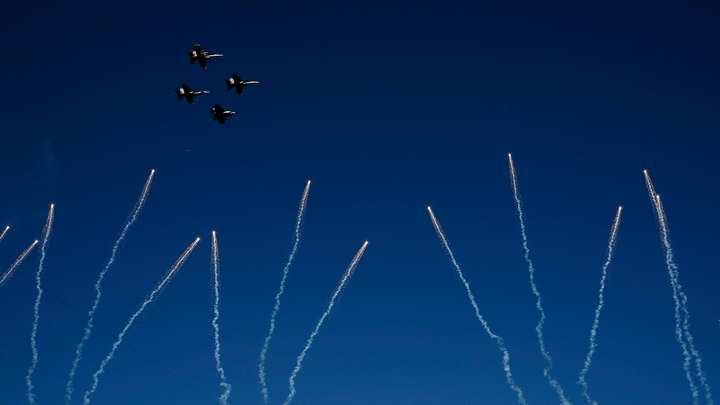 Navy pilots perform a flyover before Super Bowl LVII at State Farm Stadium on Feb. 12, 2023, in Glendale, Arizona. (Tasos Katopodis / Getty Images)